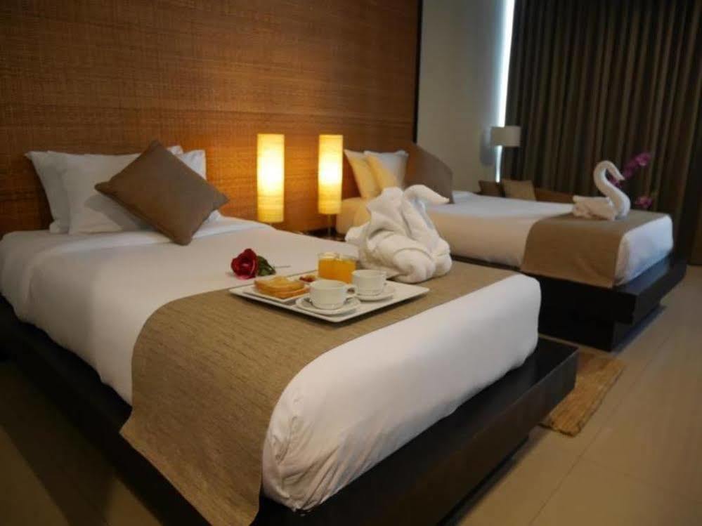 Swutel Hotel Bangkok Bagian luar foto